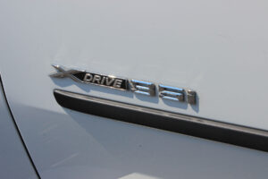 Eastern Adhesive double coated foam tape securing a car's nameplate